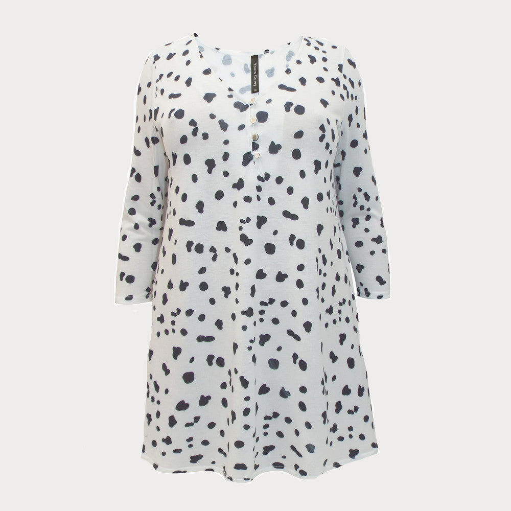 A black and white Dalmatian print swing tunic top with three quarter length sleeves. 