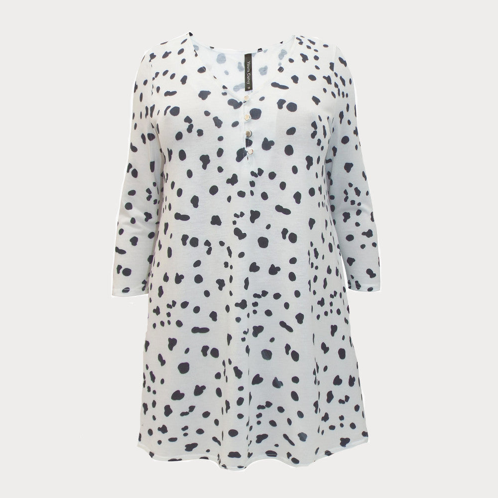 A black and white Dalmatian print swing tunic top with three quarter length sleeves. 
