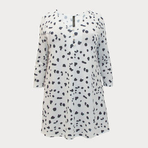 A black and white Dalmatian print swing tunic top with three quarter length sleeves. 
