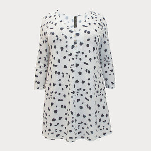 A black and white Dalmatian print swing tunic top with three quarter length sleeves. 