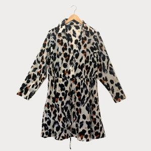 Plus size leopard print shirt dress with drawstring waist, photographed against a white background. 